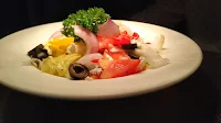 Garnished Greek salad in serving plate