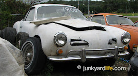 This white 1966 Volkswagen Karmann Ghia project had a price of $1800 on the windshield.