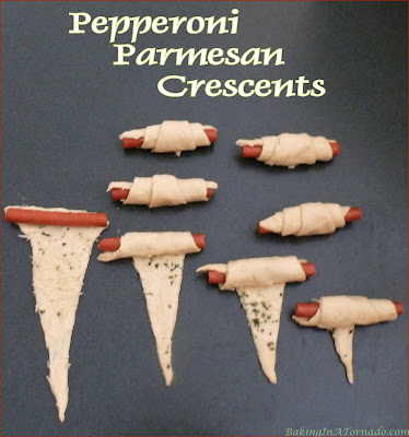 Pepperoni Parmesan Crescents are a quick snack for an afternoon with a book, or just as easily served as an appetizer. | Recipe developed by www.BakingInATornado.com | #recipe #snack