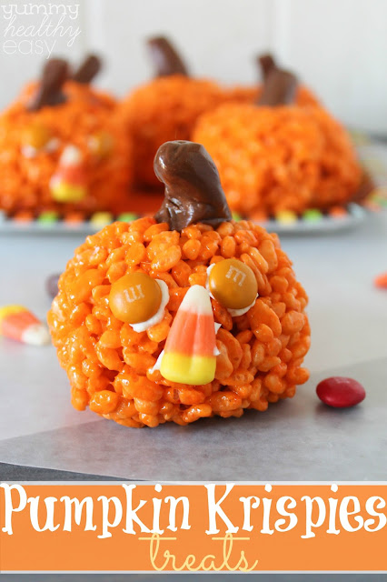 Pumpkin Krispies Treats (with candy corn noses!) by Yummy Healthy Easy