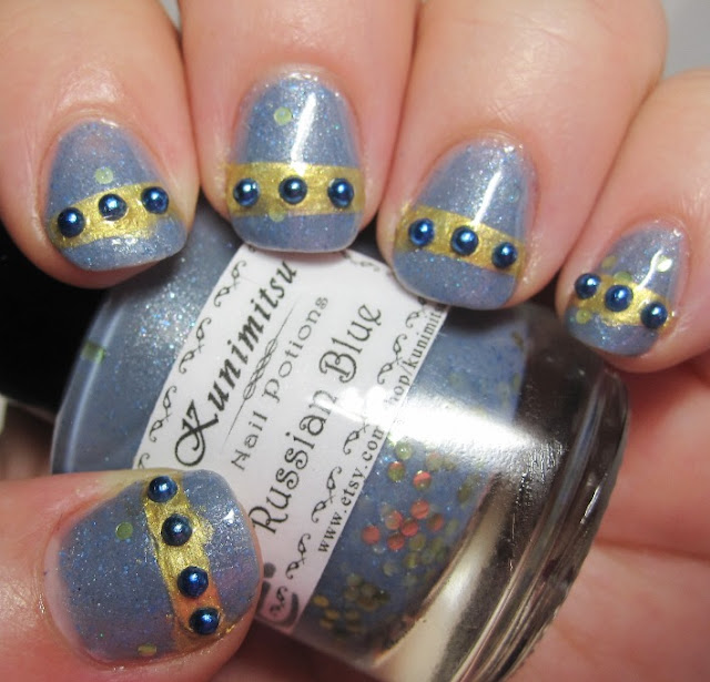 Russian blue, gold stripe, and pearl details.