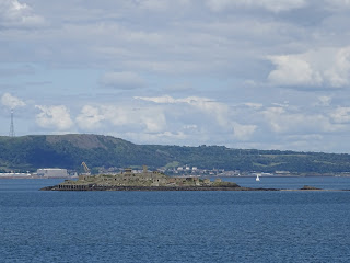 A view from Cramond Island of Inchmickery Island which is so heavily fortified that it looks like a battleship sitting out at sea.  Photo by Kevin Nosferatu for the Skulferatu Project.