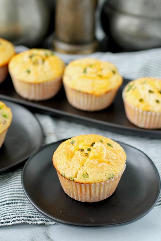 Bacon cheddar muffins on plates