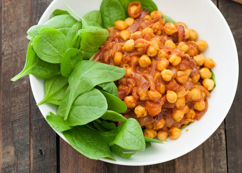 Chickpea Curry (Chole Masala) is a traditional vegetarian South African Indian recipe using a blend of chickpeas, vegetables and eight spices.