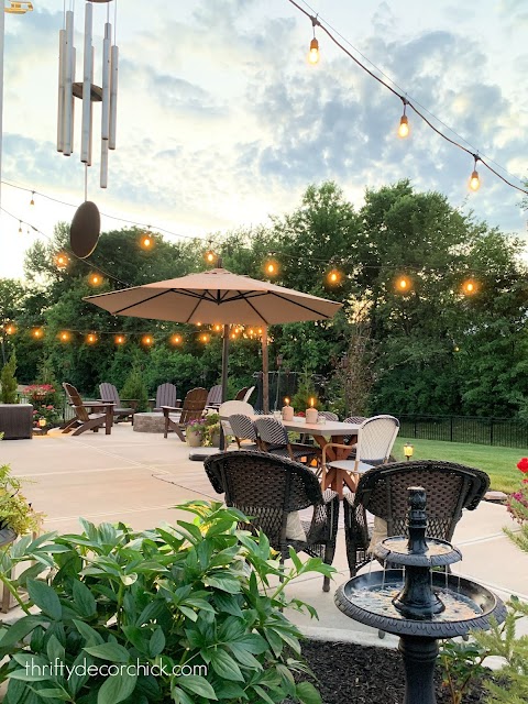 Long cement patio with cafe lights