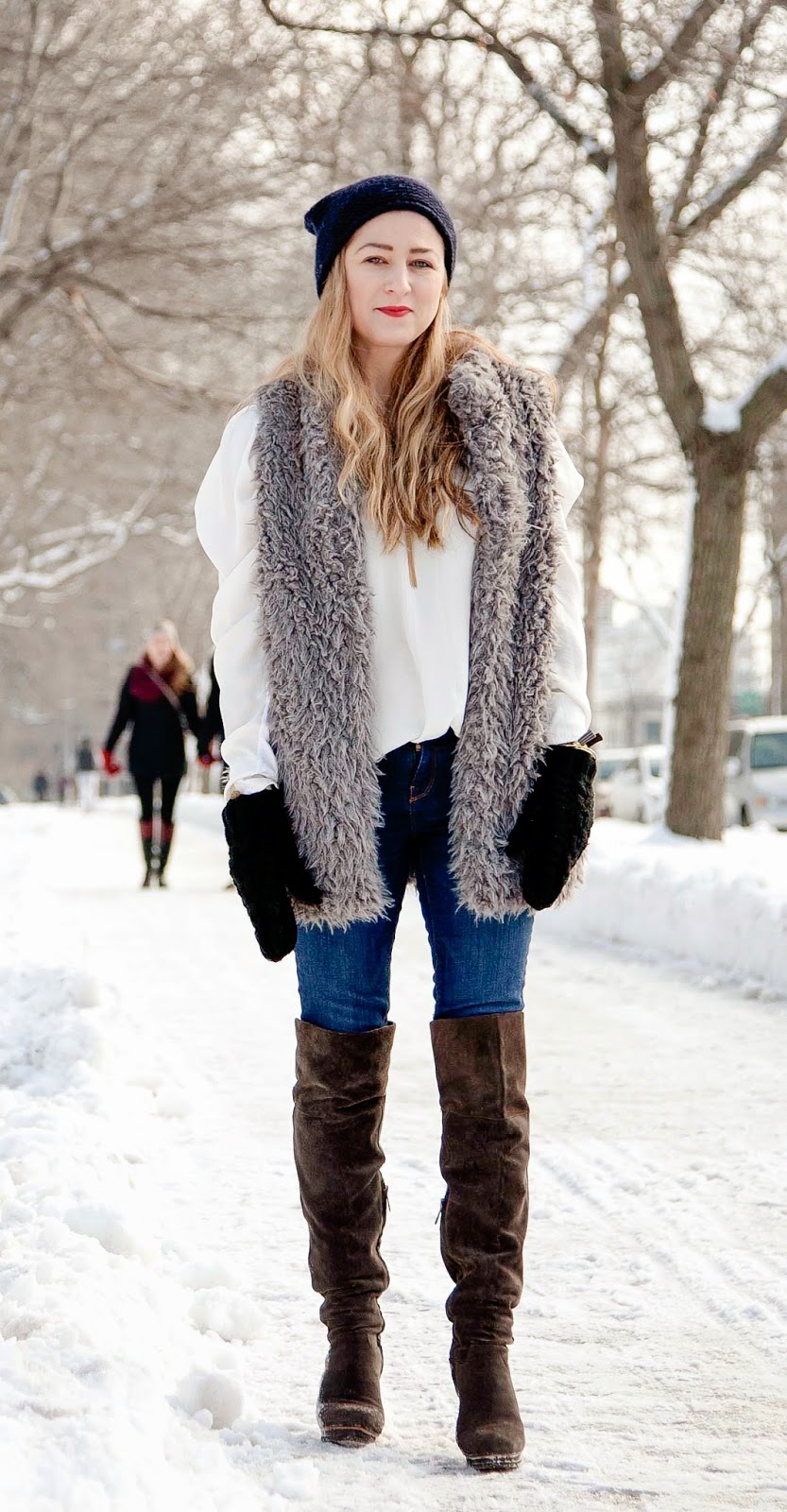 faux fur vest, over the knee high boots