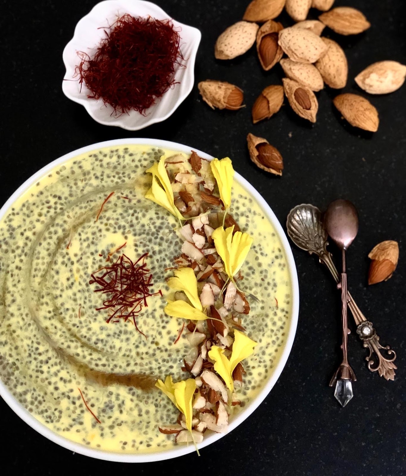 Chia pudding with saffron milk and almonds