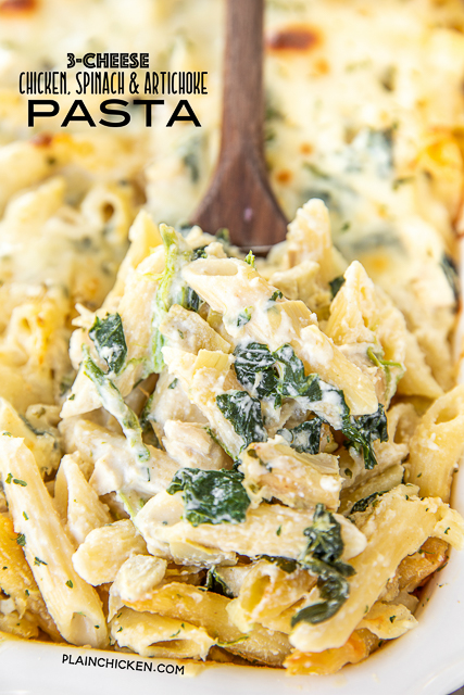 Three Cheese Chicken Spinach & Artichoke Alfredo Pasta - think cheesy chicken Alfredo pasta meets spinach & artichoke dip. Two of my all-time favorites in one pan. Super easy to make. Can freeze for a quick meal later!! Penne pasta, Alfredo sauce, ricotta cheese, sour cream, garlic, parmesan cheese, frozen spinach, chopped artichokes, eggs, and chopped chicken. Use a rotisserie chicken for quick prep. Makes a ton - great for a crowd! #pasta #chicken #spinach #artichokes #casserole #freezermeal spoonful of chicken pasta