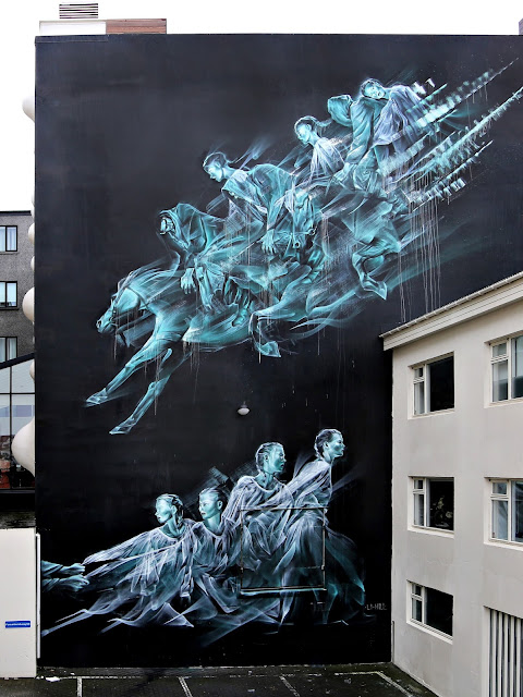 Li-Hill's latest wall was done in Reykjavik on the old Iceland Opera building as part of Wall Poetry.
