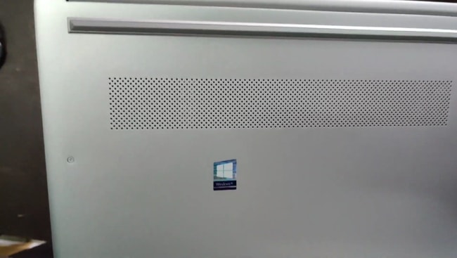 Air intake vents on the back cover of HP 14s dr1009tu laptop.