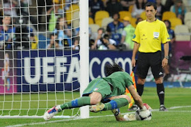 Buffon saves a penalty from England's Ashley Cole during Italy's quarter-final shoot-out win at Euro 2012