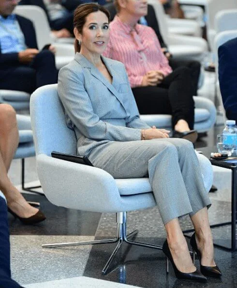 Crown Princess Mary wore a jumpsuit from Max Mara spring/summer 19 collection. diamond earring, Gianvito Rossi black pumps, Carlend clutch