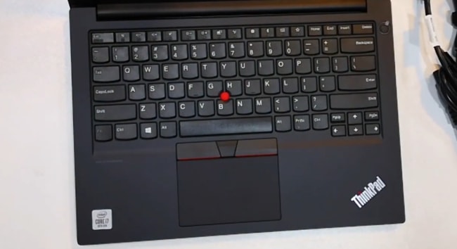 Tactile keyboard of this ThinkPad E14 with black keys and white fonts on it.