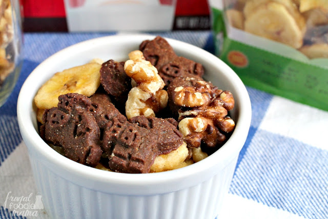 This Chunky Monkey Snack Mix is a crunchy mix of whole wheat chocolate grahams, organic banana chips, & satisfying walnuts. It is sure to quickly become a lunchbox & after school snack favorite.