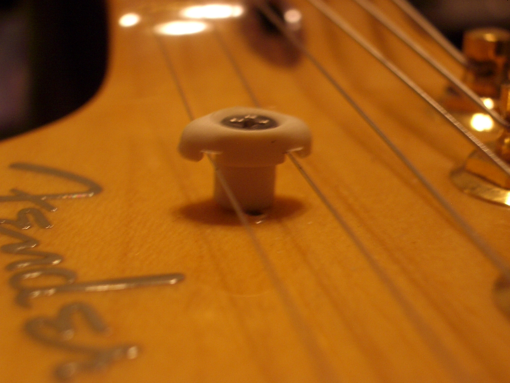 Guitar Snob Graph Tech's Tusq String tree work great!