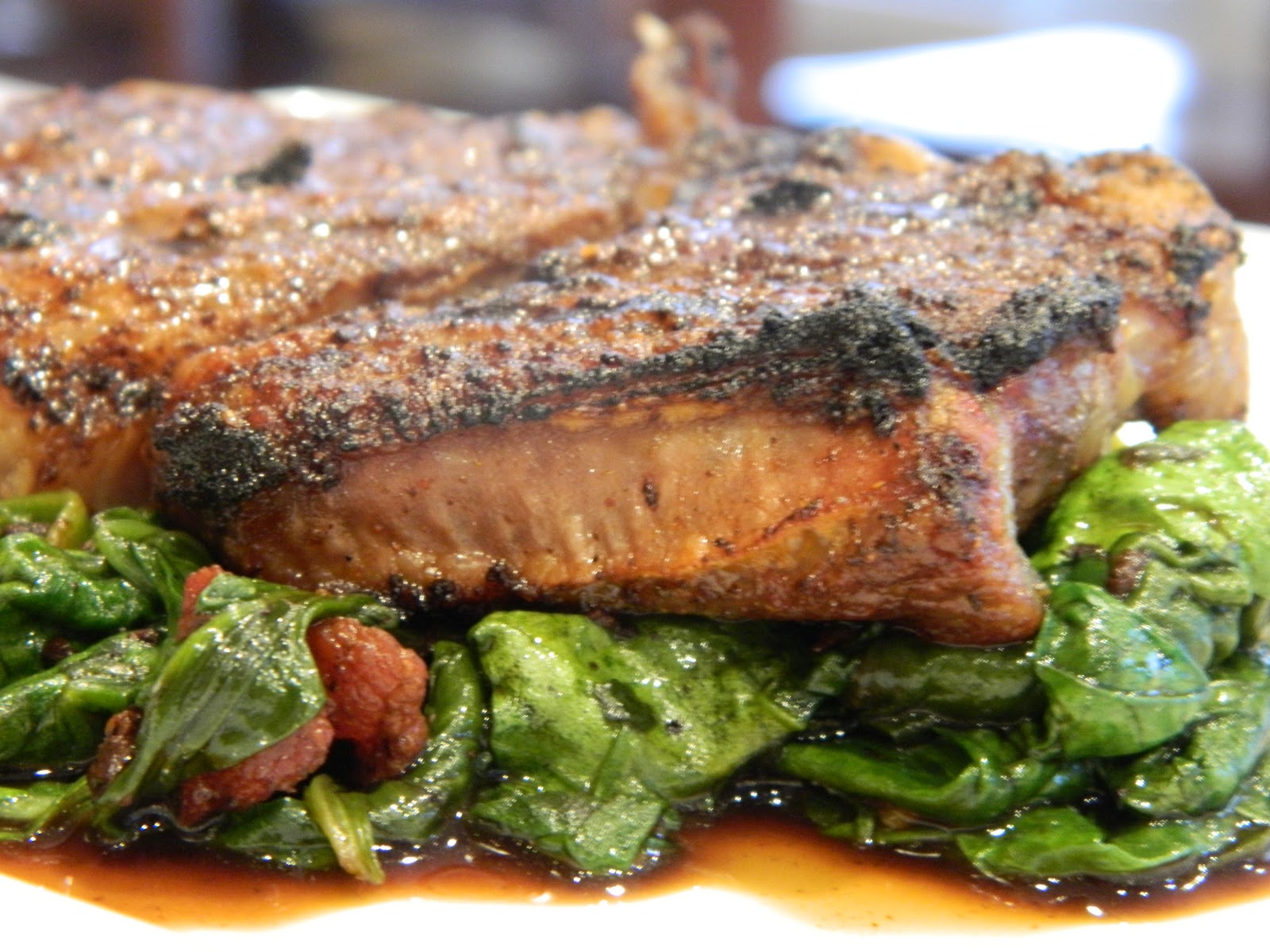 Primal Bites Espresso Crusted Ribeye with Bacon Balsamic Spinach