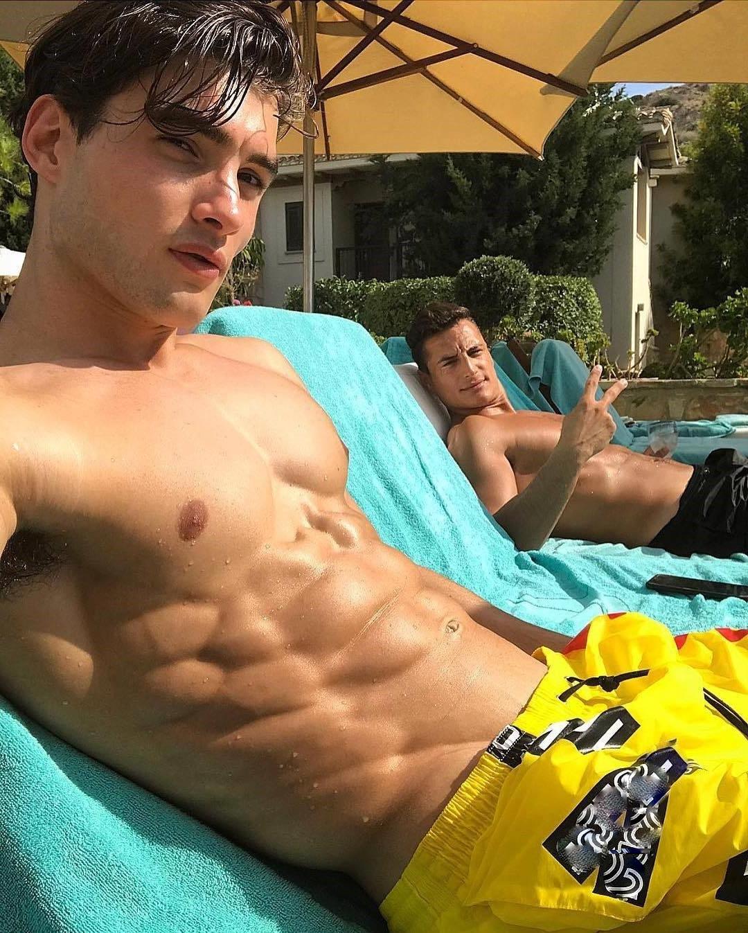 two-young-male-models-sun-tanning-shirtless-wet-fit-body-abs-sexy-boys-selfie