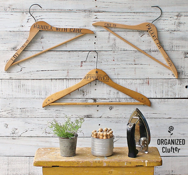 Stenciled Wooden Clothes Hanger Wall Decor #oldsignstencils #stencil #laundryroomdecor #repurposed #clotheshangers #woodhangers