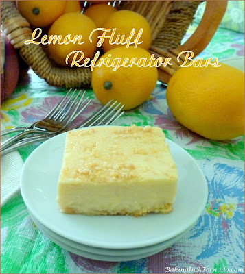 Lemon Fluff Refrigerator Bars (with a lower fat option) are a sweet, citrusy summer dessert. | Recipe developed by www.BakingInATornado.com | #recipe #dessert