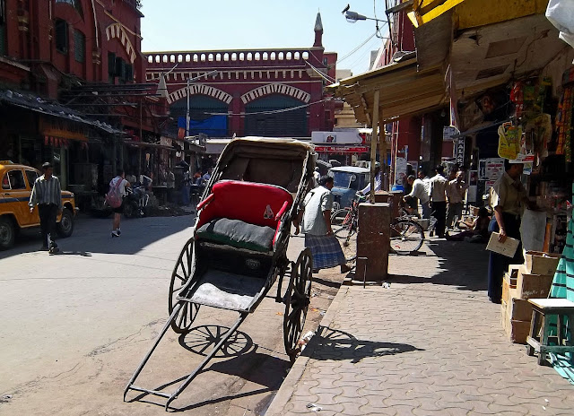 hand rickshaw in busy market