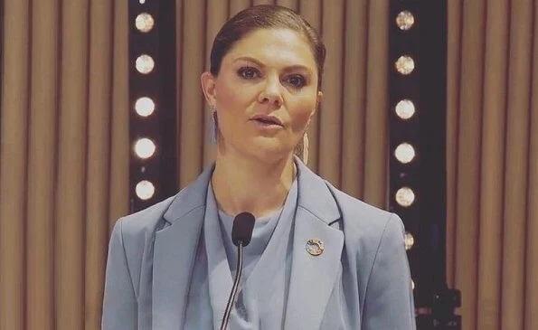 Crown Princess Victoria wore a Narina blazer, Rosaria trousers and Volon mist blue silk top, blouse from Tiger of Sweden