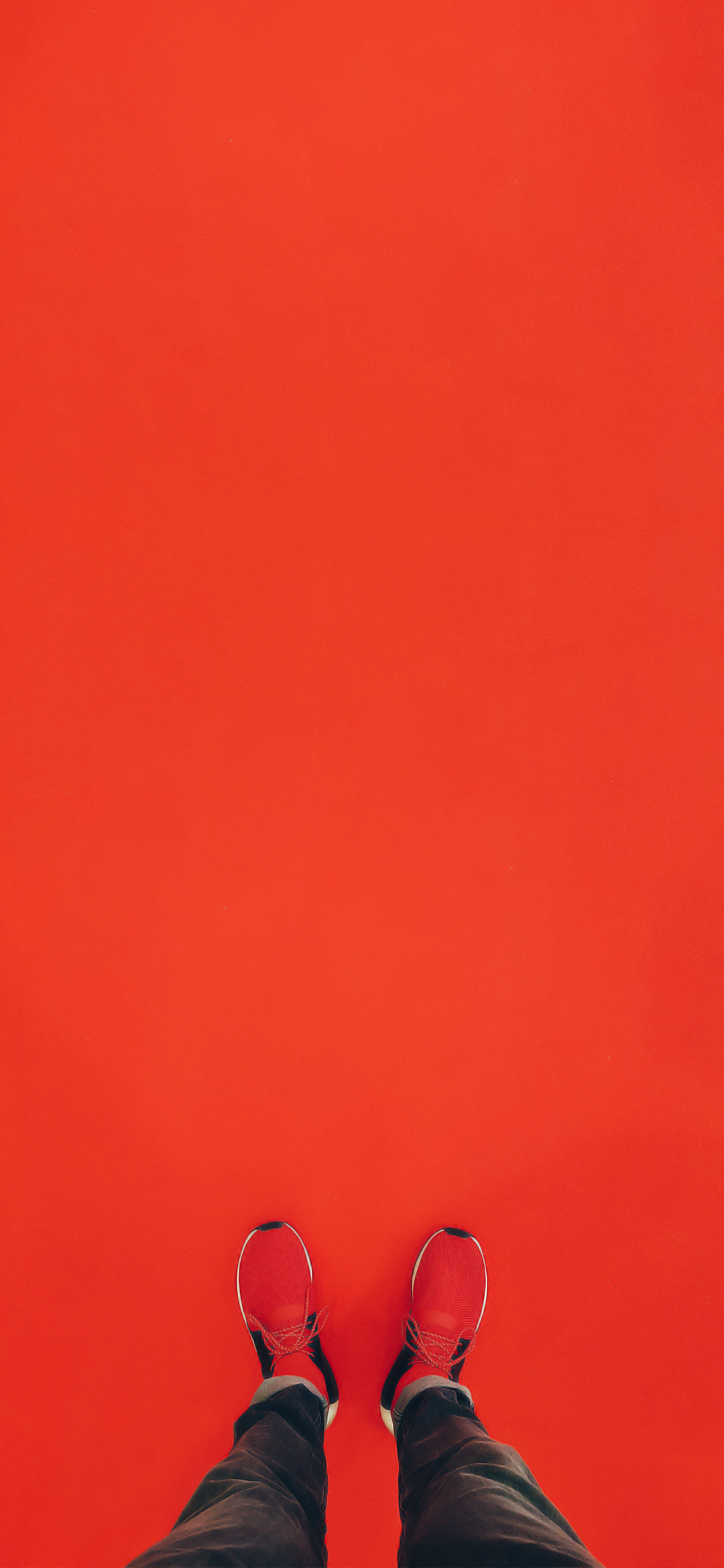 person-wearing-red-running-shoe-wallpaper