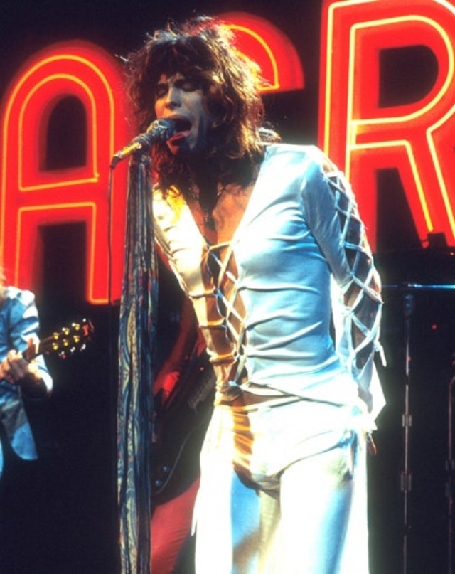 Amazing Photographs of Steven Tyler of Aerosmith on the Stage in the