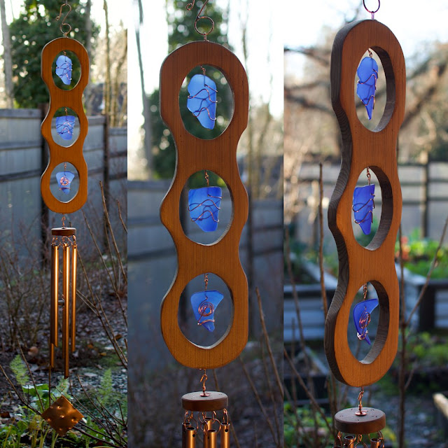 Curving old growth red cedar with blue glass and copper wind chime by Coast Chimes