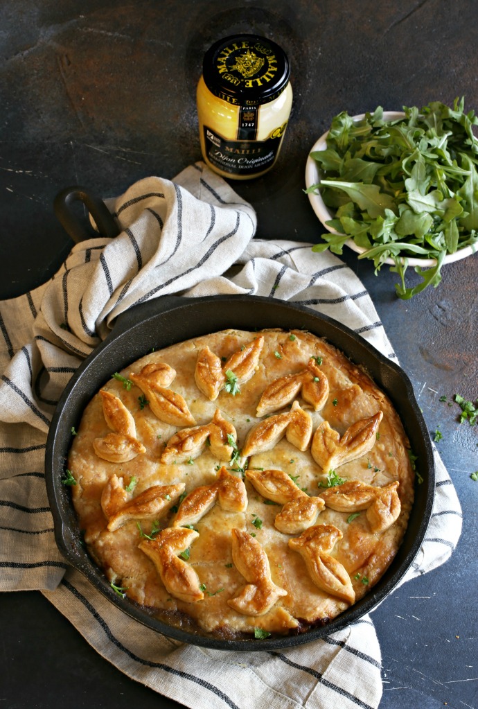 Recipe for a skillet pie with ground beef, mustard sauce and flaky pastry crust.