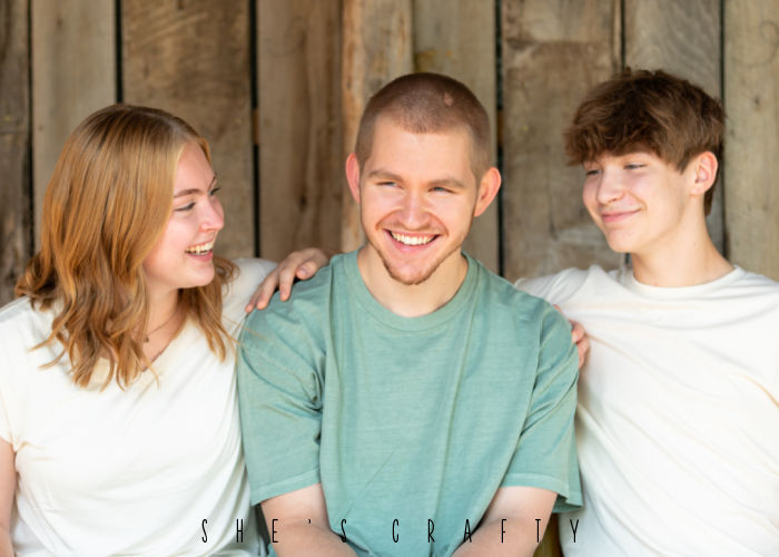 6 things no one tells you when your kids leave home - family picture of 3 teens.