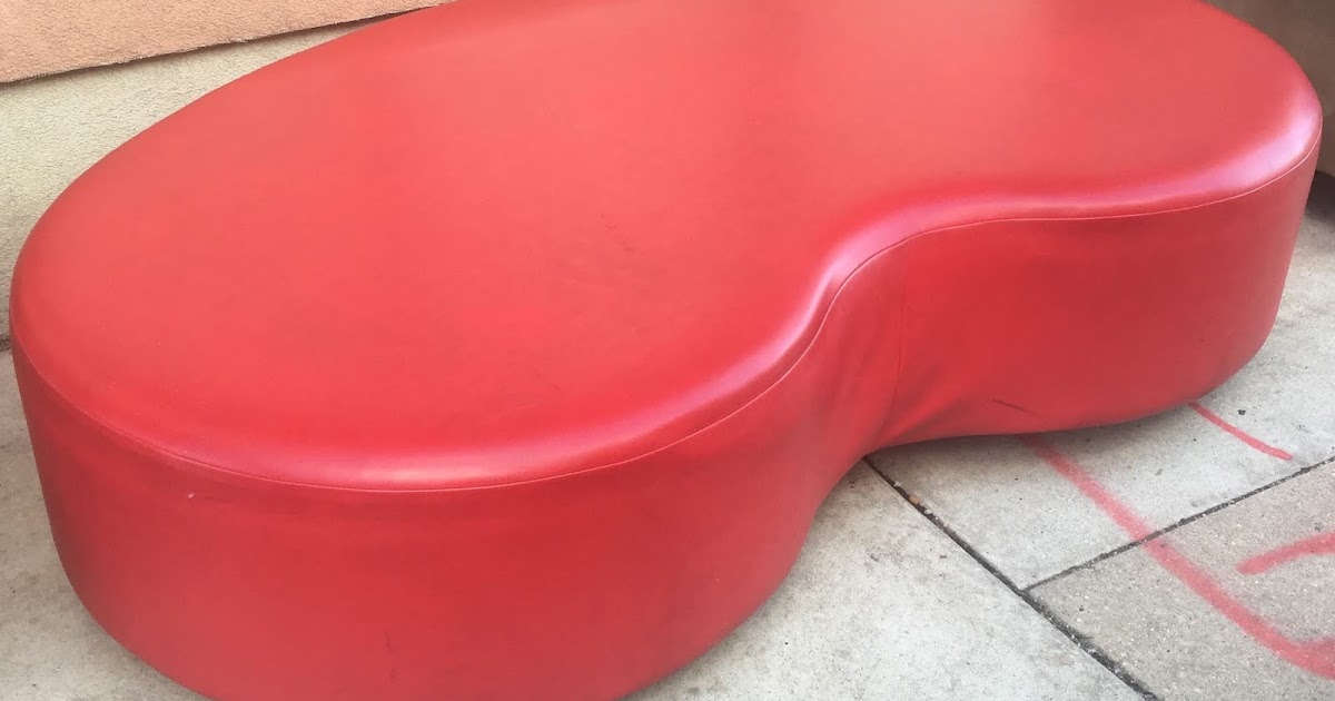 Uhuru Furniture & Collectibles Leather KidneyShaped Ottoman 250 SOLD