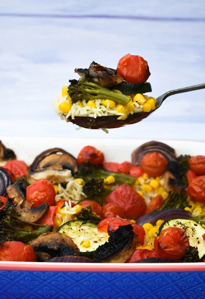 Close up of Roasted vegetable rice bake, the vegetables are colourful and charred at the edges