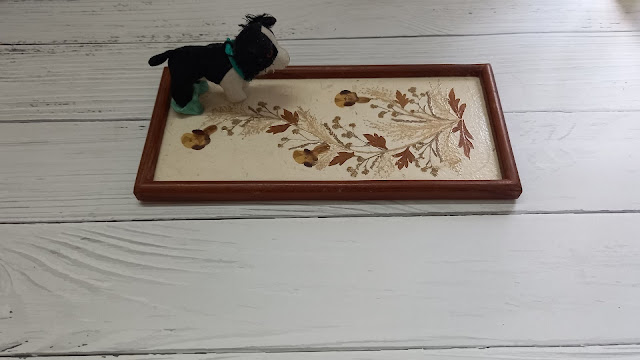 Tack-It was used to attach the object to the tray as décor Tack-It was used to attach the object to the tray as décor