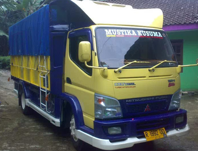 Truk Modifikasi Sakera-kuning biru