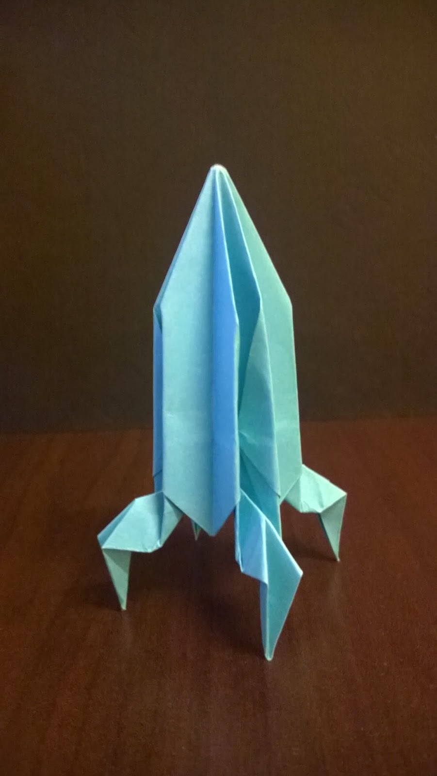 Оригами космос. Оригами ракета. Бумажная ракета оригами. Космическая ракета оригами. Оригами ракета объемная.