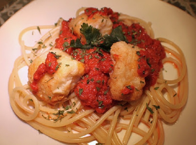 Christmas Eve Baccala Codfish Baccalà , or salted codfish is a plate of pasta topped with marinara sauce and fried salted cod fish called baccala