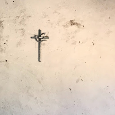 Cross on a Mud Spattered Wall - Tanzania 2018