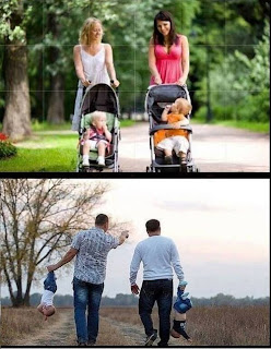 fathers carrying babies by legs, mummies with prams