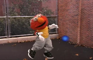 Dorothy then imagines Elmo playing handball. Sesame Street Elmo's World Hands Tickle Me Land