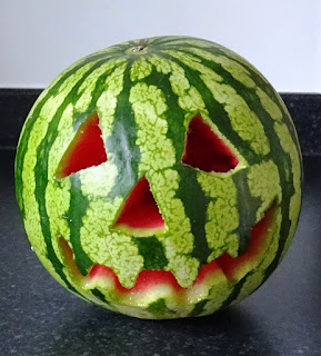 A Summerween Jack-o-Melon
