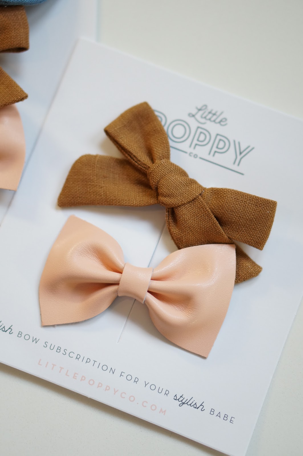 North Carolina style blogger Rebecca Lately shares Little Poppy Co bows for January. Read more here!