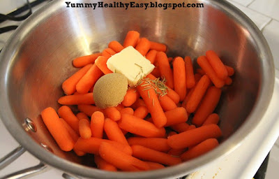 Pan filled with Brown Sugar Glazed Carrot ingredients - carrots, brown sugar, butter and rosemary. (step by step instructions)