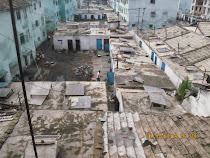 Shabby worker housing, not on itinerary, Pyong-sung, North Korea