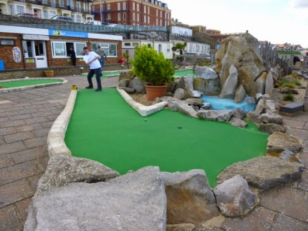 Richard Gottfried playing the 14th hole at Strokes Adventure Golf course