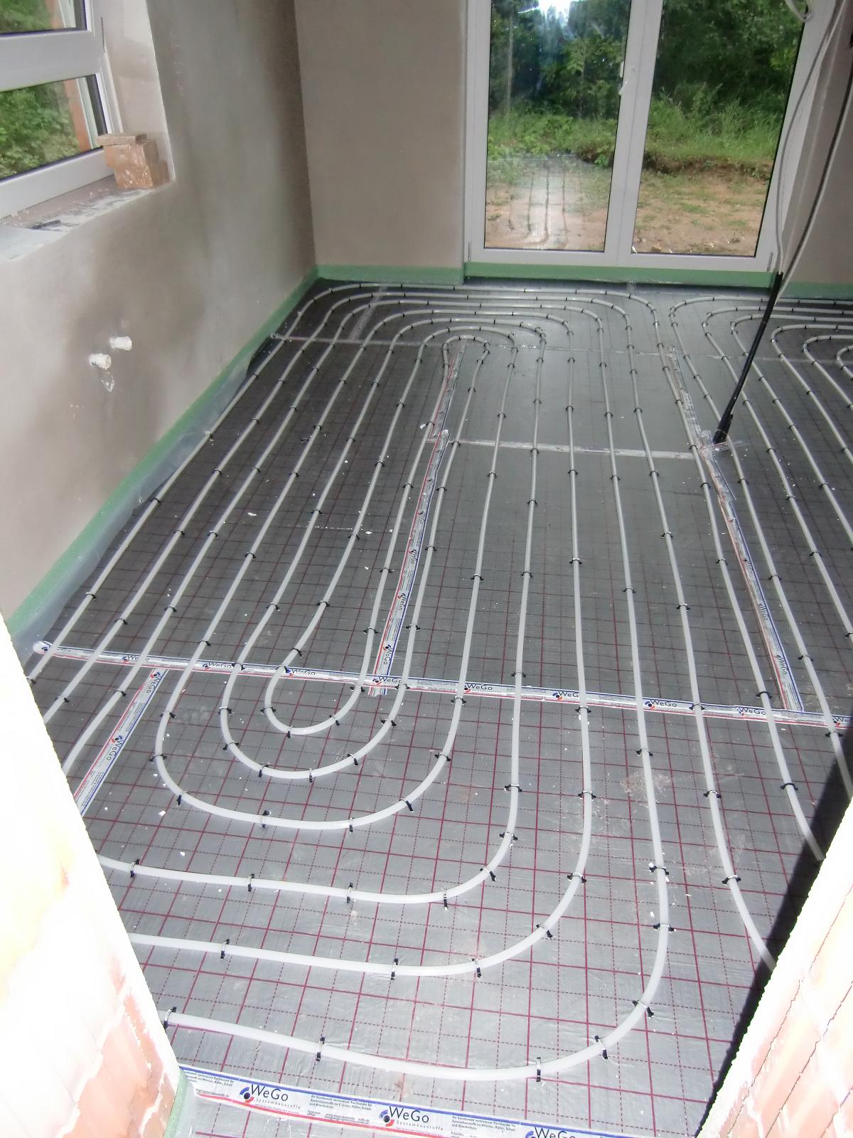 Neues vom Bau: Garage, Putz und Fussbodenheizung