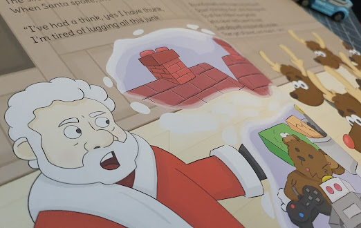 inside page illustration with Santa and reindeer