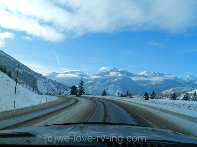 We see snow covered mountains in the distance