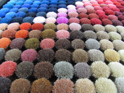 Wool pom poms for custom rugs Judit Gueth custom rugs