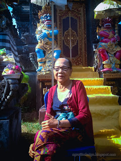 Portrait Of Grandmother Under Morning Sunlight In The Middle Of Balinese Hindu Temple Ringdikit North Bali Indonesia