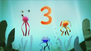 Two kids find three jellyfish in the sea. Sesame Street Episode 4420, Three Cheers for Us, Season 44